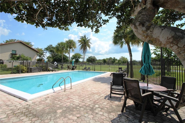 12951 SW 95th Ave, Miami, FL 33176 - community pool featuring a patio