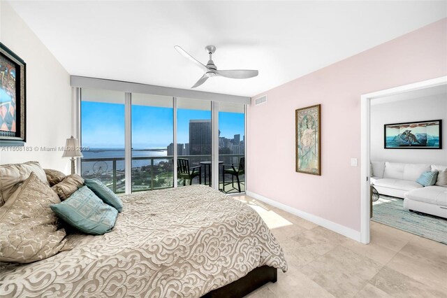 888 Biscayne Blvd Unit 3702, Miami, FL 33132 - bedroom featuring a water view, access to outside, ceiling fan, floor to ceiling windows, and a view of skyline