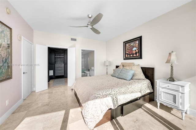 888 Biscayne Blvd Unit 3702, Miami, FL 33132 - bedroom with baseboards, ensuite bath, a walk in closet, a ceiling fan, and a closet