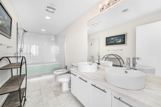 888 Biscayne Blvd Unit 3702, Miami, FL 33132 - bathroom featuring a bidet, toilet, double vanity, recessed lighting, and marble finish floors