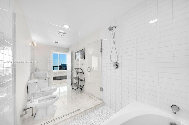 888 Biscayne Blvd Unit 3702, Miami, FL 33132 - full bathroom featuring ensuite bath, a shower, a bidet, toilet, and a bath