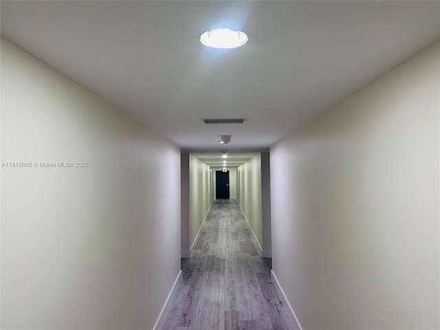 11040 SW 196th St Unit 209, Cutler Bay, FL 33157 - corridor featuring wood finished floors and baseboards