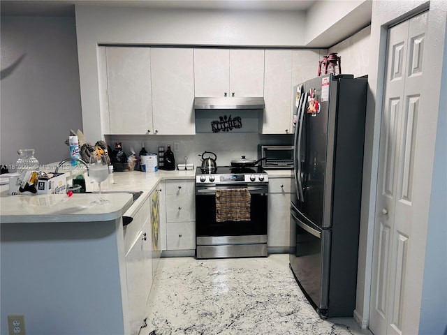 11040 SW 196th St Unit 209, Cutler Bay, FL 33157 - kitchen featuring electric range, freestanding refrigerator, range hood, white cabinets, and light countertops