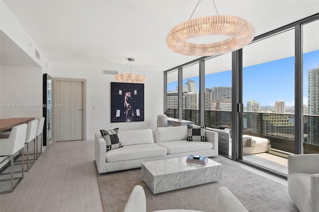 1000 Brickell Plz Unit 4209, Miami, FL 33131 - living room with a chandelier, a view of skyline, expansive windows, and light tile patterned floors