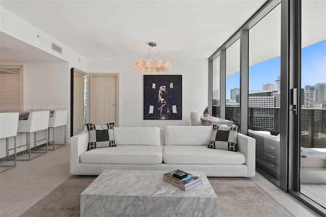 1000 Brickell Plz Unit 4209, Miami, FL 33131 - living room with a chandelier and a view of city