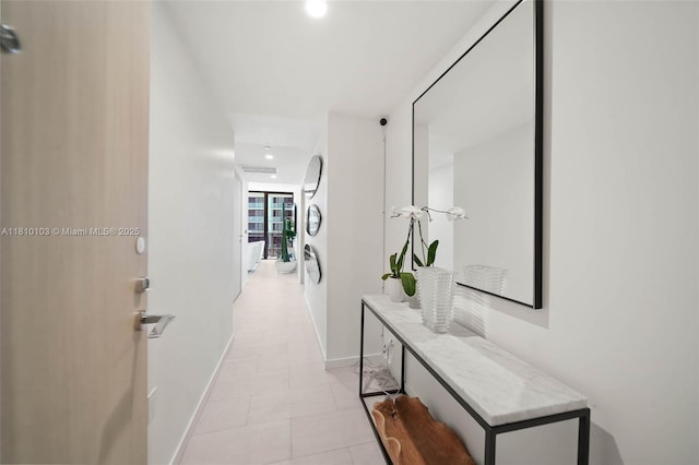 1000 Brickell Plz Unit 4209, Miami, FL 33131 - hall with baseboards, light tile patterned flooring, and recessed lighting
