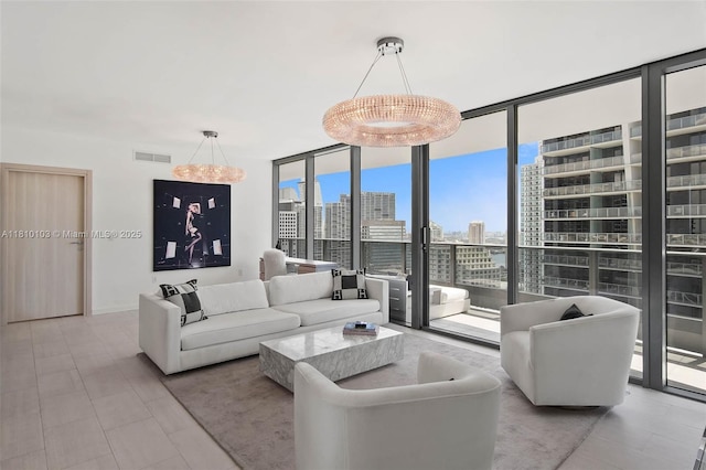 1000 Brickell Plz Unit 4209, Miami, FL 33131 - living room with a skyline view and expansive windows