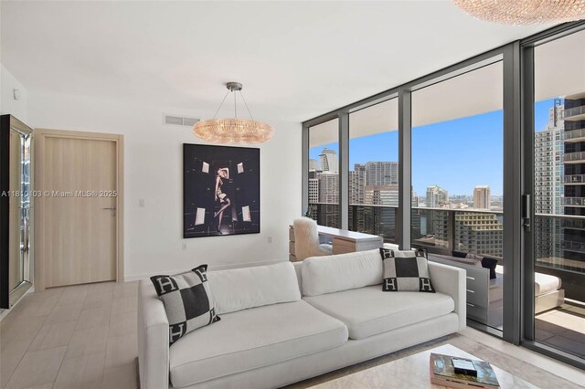 1000 Brickell Plz Unit 4209, Miami, FL 33131 - living room with expansive windows and a view of skyline