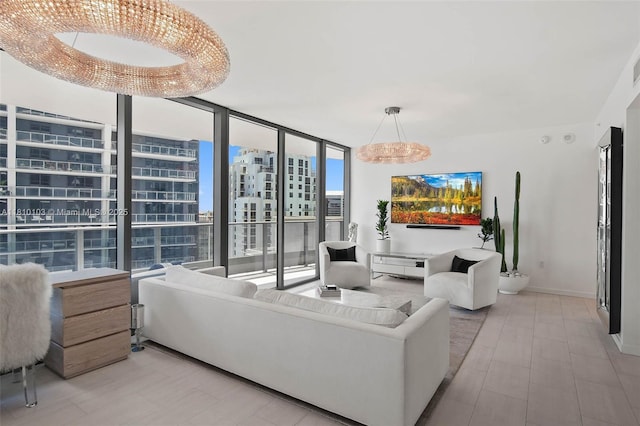 1000 Brickell Plz Unit 4209, Miami, FL 33131 - living area featuring expansive windows and baseboards