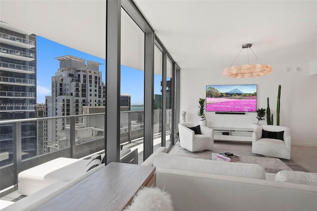 1000 Brickell Plz Unit 4209, Miami, FL 33131 - living area featuring healthy amount of natural light, wood finished floors, baseboards, and expansive windows