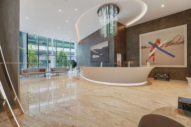 1000 Brickell Plz Unit 4209, Miami, FL 33131 - reception featuring a high ceiling and recessed lighting