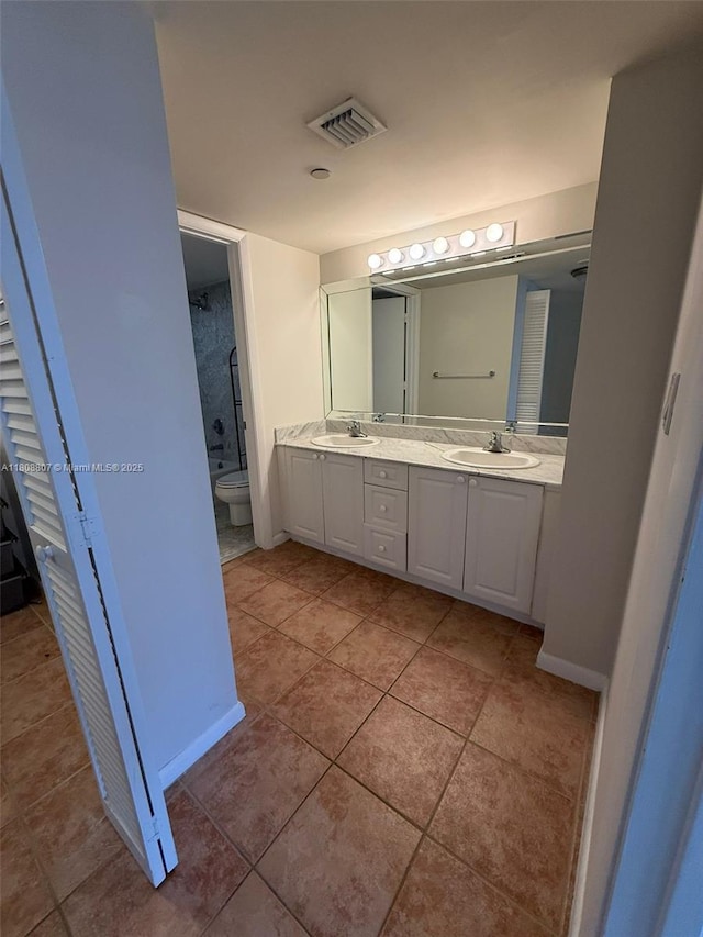 8911 Collins Ave Unit 1103, Surfside, FL 33154 - full bath featuring double vanity and tile patterned floors