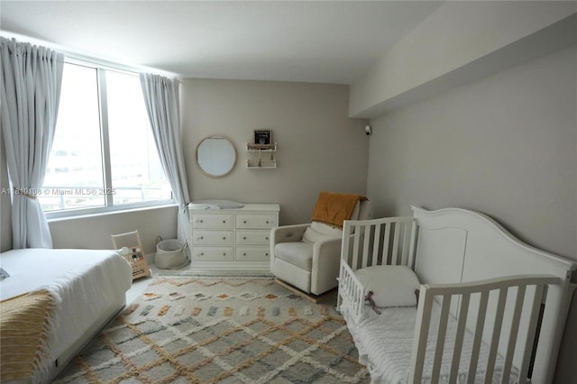 325 S Biscayne Blvd Unit 1822, Miami, FL 33131 - bedroom featuring a crib