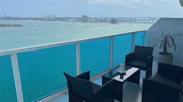 700 NE 25th St Unit 1703, Miami, FL 33137 - balcony featuring a skyline view and a water view