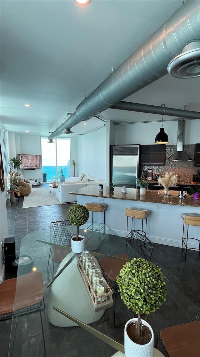 700 NE 25th St Unit 1703, Miami, FL 33137 - living room featuring baseboards and recessed lighting