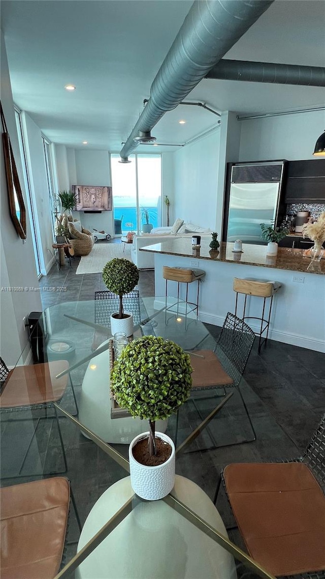 700 NE 25th St Unit 1703, Miami, FL 33137 - dining area featuring baseboards and recessed lighting