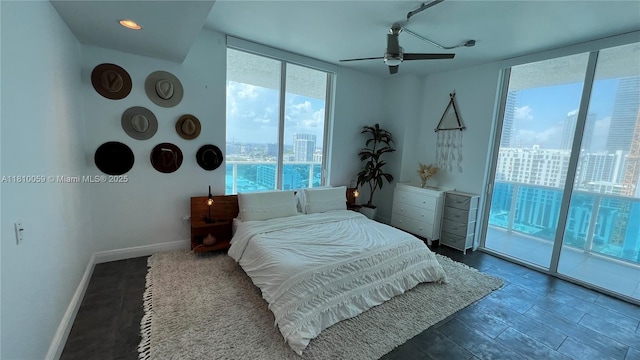 700 NE 25th St Unit 1703, Miami, FL 33137 - bedroom featuring access to outside, a city view, baseboards, ceiling fan, and floor to ceiling windows