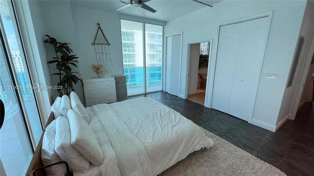 700 NE 25th St Unit 1703, Miami, FL 33137 - bedroom featuring access to exterior, multiple closets, and baseboards