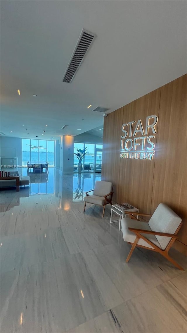 700 NE 25th St Unit 1703, Miami, FL 33137 - lobby featuring wood walls