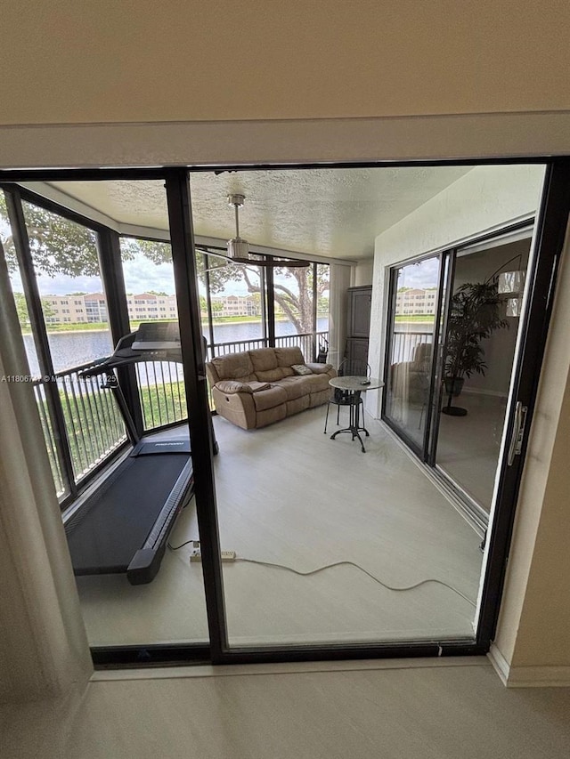 7443 Fairfax Dr Unit 208, Tamarac, FL 33321 - sunroom featuring a water view