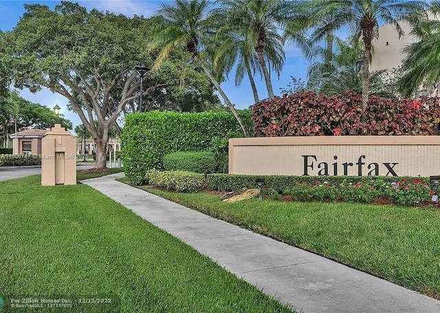 7443 Fairfax Dr Unit 208, Tamarac, FL 33321 - community sign featuring a lawn