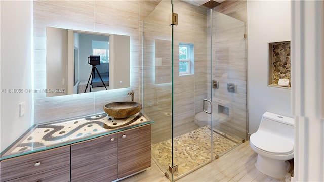 7 Montilla Ave, Coral Gables, FL 33134 - full bathroom featuring vanity, a shower stall, toilet, and healthy amount of natural light