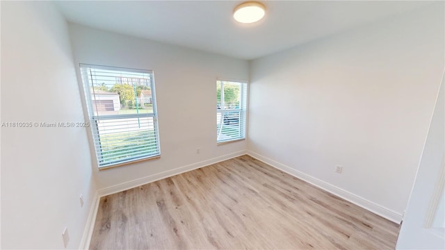 7 Montilla Ave, Coral Gables, FL 33134 - empty room with light wood-type flooring and baseboards