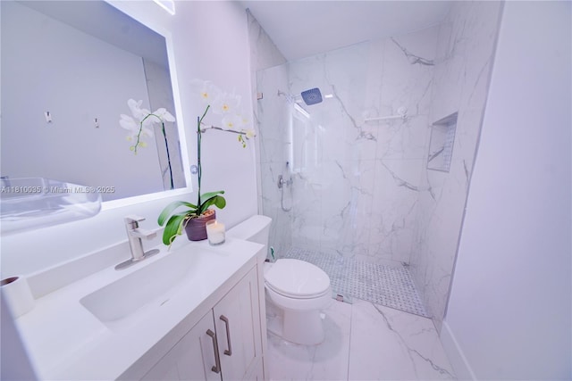 7 Montilla Ave, Coral Gables, FL 33134 - bathroom with vanity, toilet, a marble finish shower, and marble look tiles