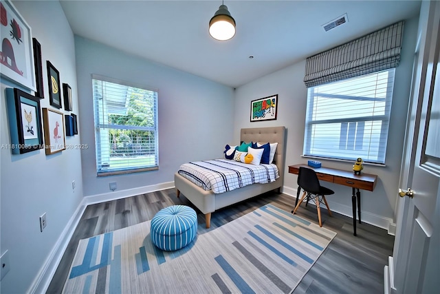 7 Montilla Ave, Coral Gables, FL 33134 - bedroom featuring dark wood-style floors and baseboards