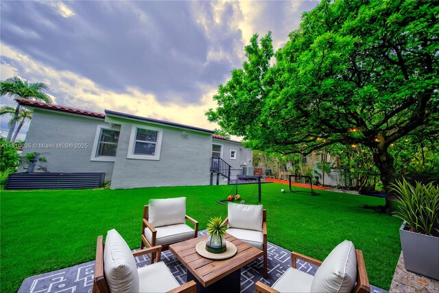 7 Montilla Ave, Coral Gables, FL 33134 - view of patio featuring an outdoor hangout area