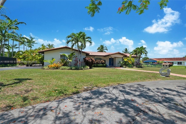 8005 SW 106th St, Miami, FL 33156 - ranch-style home featuring stucco siding and a front lawn