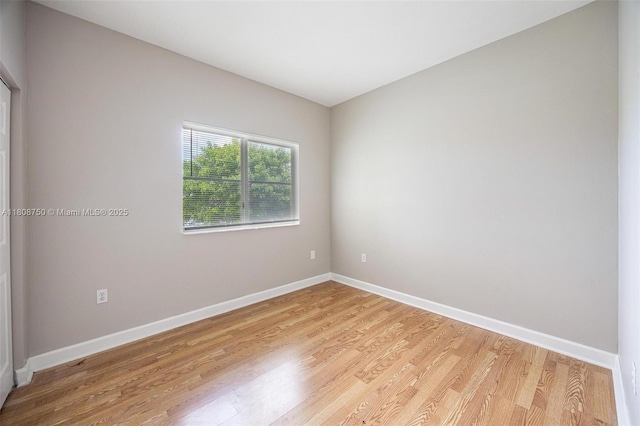 1005 NE 41st Ave, Homestead, FL 33033 - unfurnished room featuring light wood-style floors and baseboards