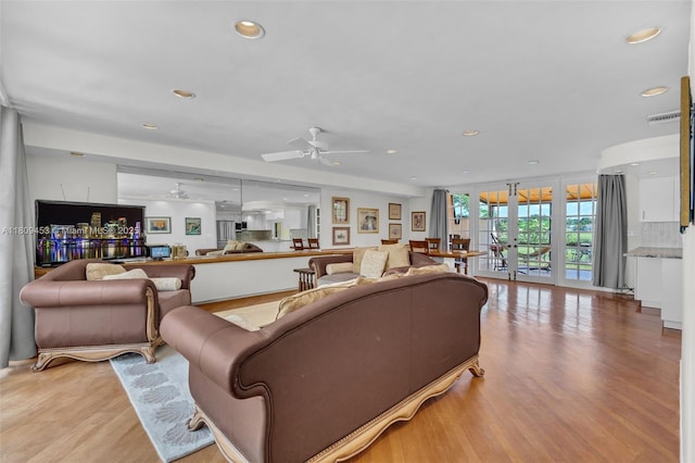 7619 SW 102nd Pl, Miami, FL 33173 - living area featuring a ceiling fan, recessed lighting, and light wood-style flooring