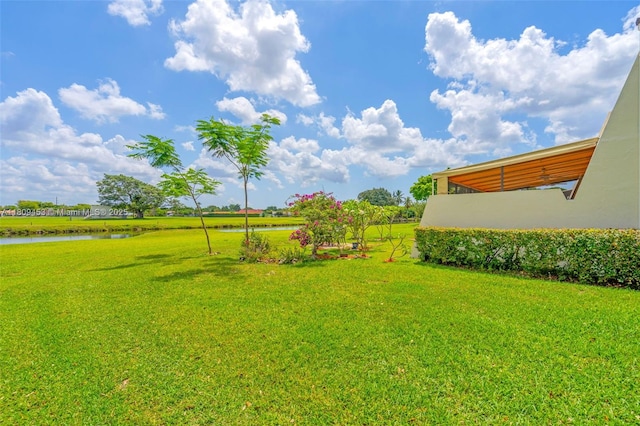 7619 SW 102nd Pl, Miami, FL 33173 - view of green lawn with a water view
