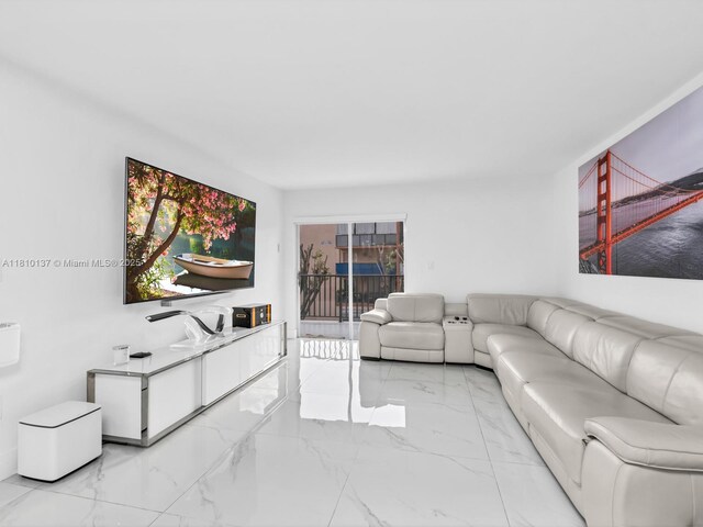 1890 W 56th St Unit 1307, Hialeah, FL 33012 - living area featuring light marble finish flooring