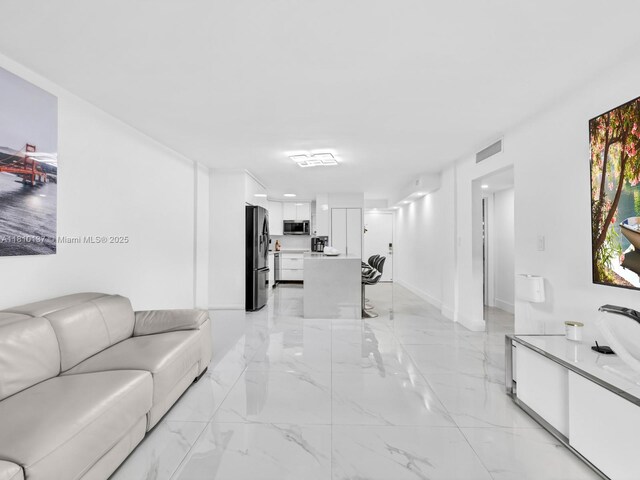 1890 W 56th St Unit 1307, Hialeah, FL 33012 - living area with light marble finish flooring