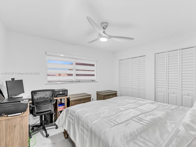1890 W 56th St Unit 1307, Hialeah, FL 33012 - bedroom featuring two closets, marble finish flooring, a ceiling fan, and an office area