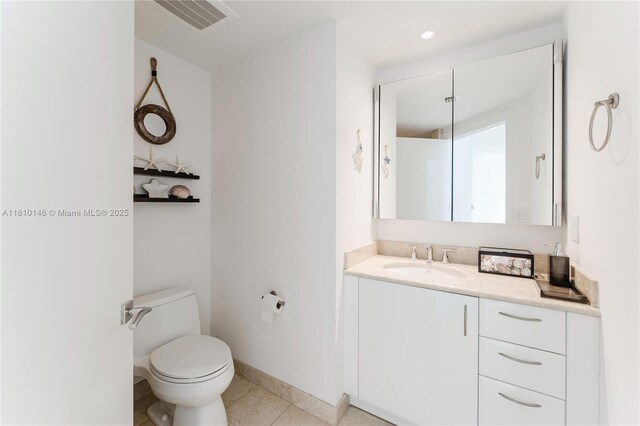 1331 Brickell Bay Dr Unit 2805, Miami, FL 33131 - bathroom with vanity, toilet, tile patterned floors, and baseboards