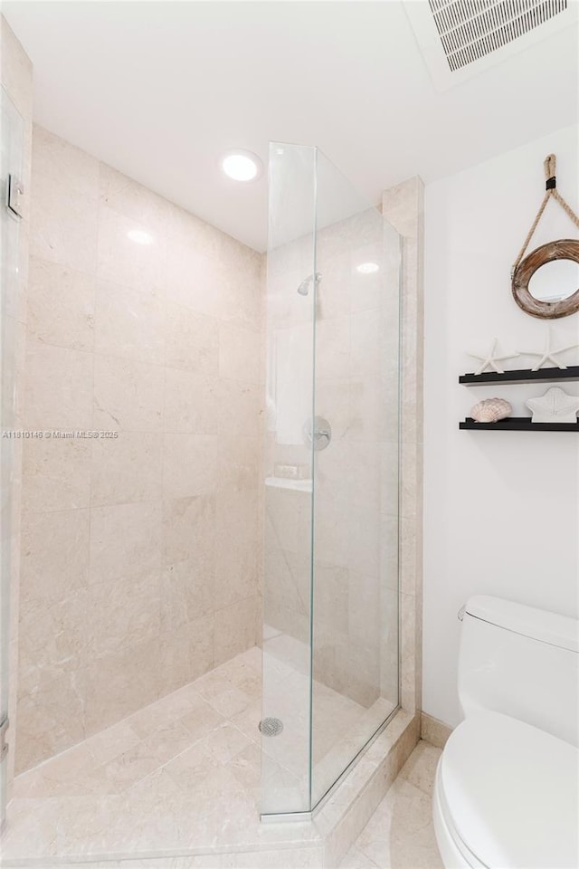 1331 Brickell Bay Dr Unit 2805, Miami, FL 33131 - bathroom featuring tiled shower and toilet