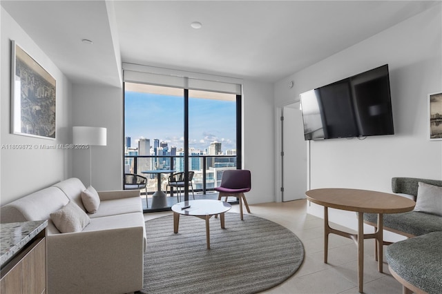 601 NE 1st St Unit 3907, Miami, FL 33132 - living room featuring a wall of windows and light tile patterned flooring