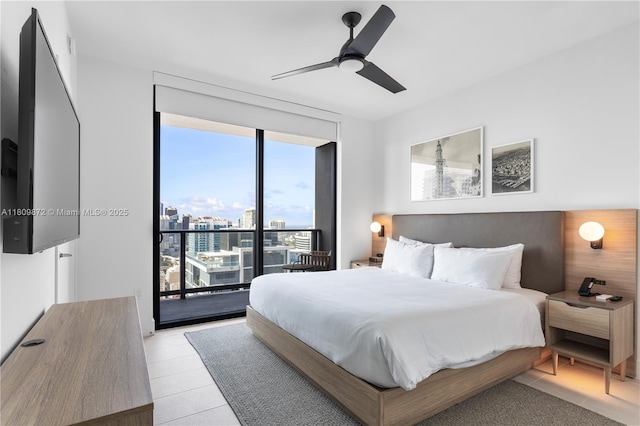 601 NE 1st St Unit 3907, Miami, FL 33132 - bedroom with access to outside and a ceiling fan
