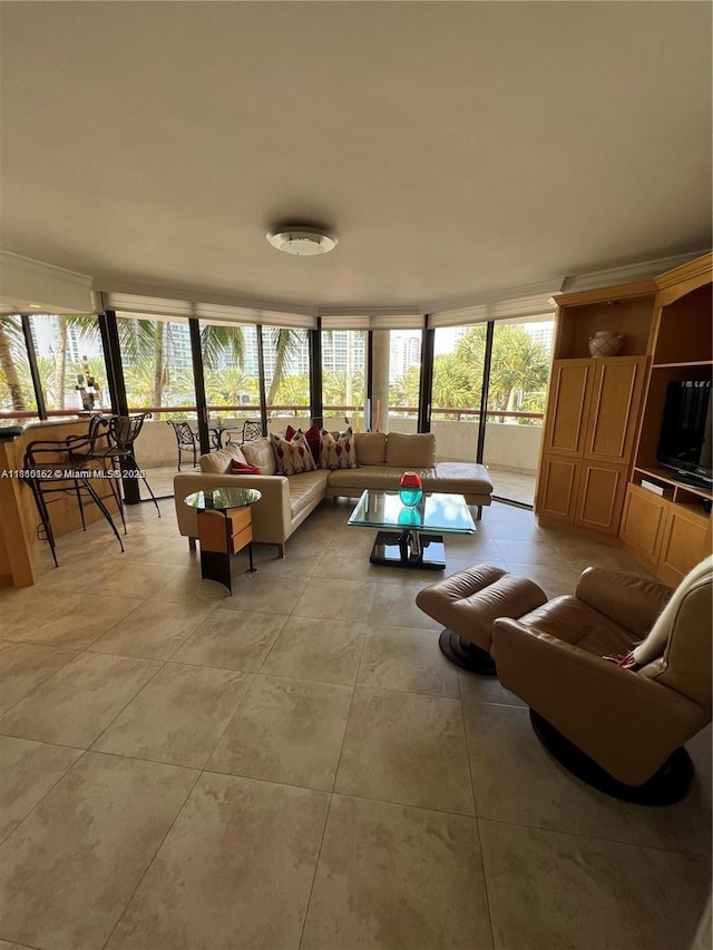 15645 Collins Ave Unit 301, Sunny Isles Beach, FL 33160 - living area featuring light tile patterned floors, healthy amount of natural light, and a wall of windows
