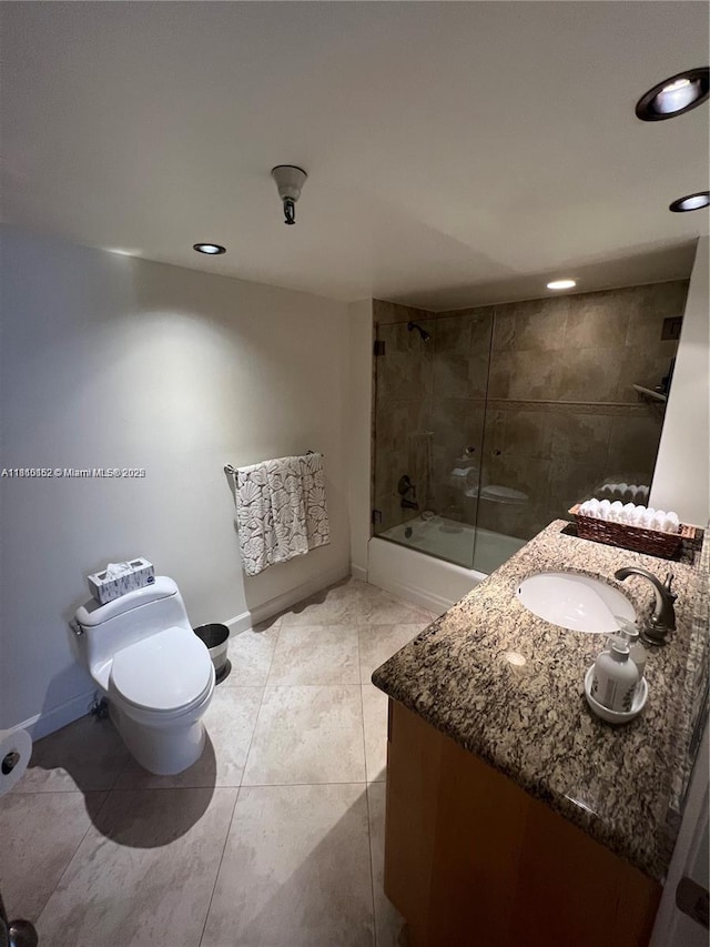 15645 Collins Ave Unit 301, Sunny Isles Beach, FL 33160 - full bathroom with toilet, vanity, enclosed tub / shower combo, recessed lighting, and tile patterned flooring
