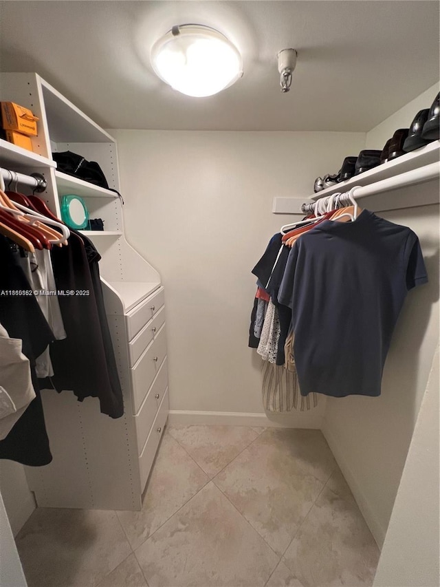 15645 Collins Ave Unit 301, Sunny Isles Beach, FL 33160 - spacious closet featuring light tile patterned floors