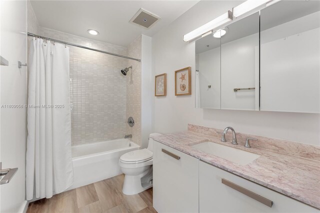 3470 E Coast Ave Unit H1402, Miami, FL 33137 - bathroom with vanity, shower / bathtub combination with curtain, toilet, wood finished floors, and recessed lighting