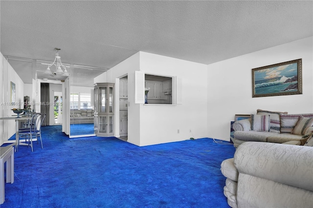 182 Westbury J 182, Deerfield Beach, FL 33442 - living area with carpet floors and a textured ceiling