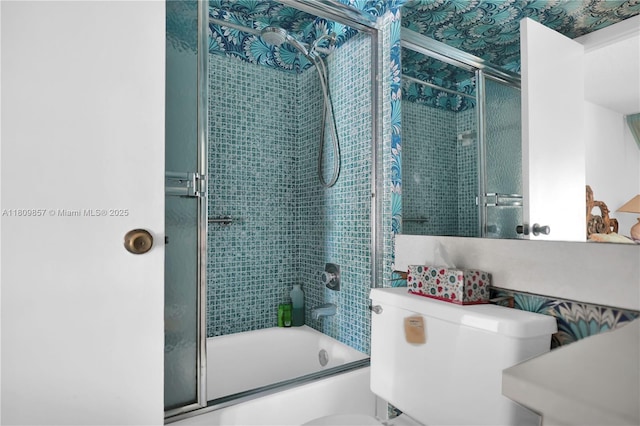 182 Westbury J 182, Deerfield Beach, FL 33442 - bathroom featuring toilet and shower / bath combination with glass door