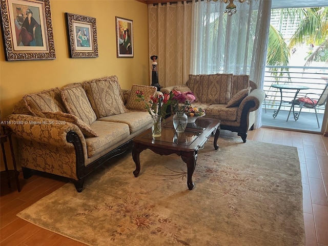 3551 NE 169th St Unit 301, North Miami Beach, FL 33160 - living area with wood finished floors
