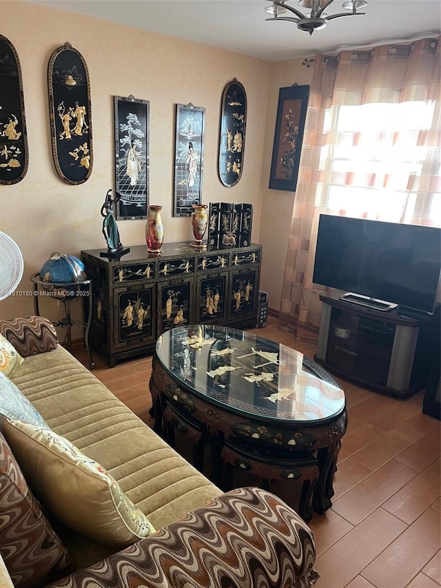 3551 NE 169th St Unit 301, North Miami Beach, FL 33160 - living area featuring wood finished floors