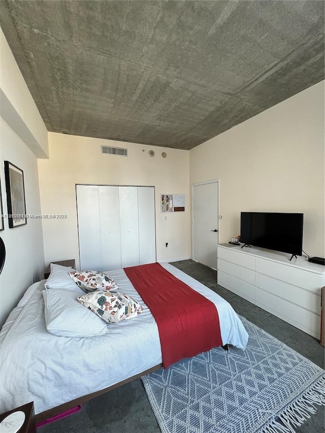 133 NE 2nd Ave Unit 913, Miami, FL 33132 - bedroom featuring a closet and carpet